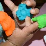 putting on play dough fingers