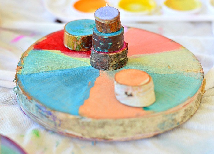 Art Activities For Kids: Painting on wood slices with watercolors